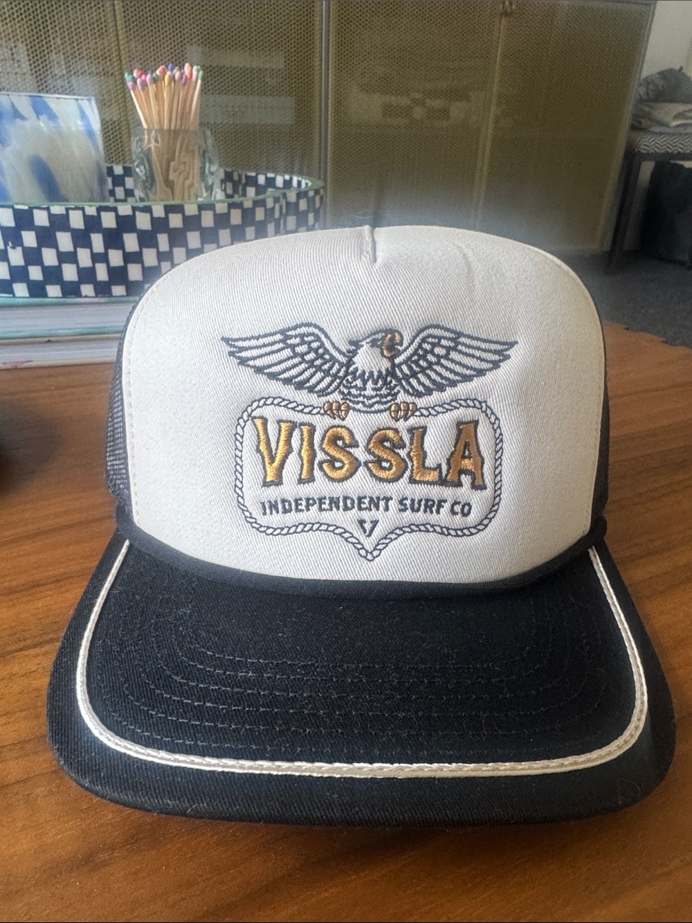 VISSLA Black and White Trucker Hat with Gold Logo
